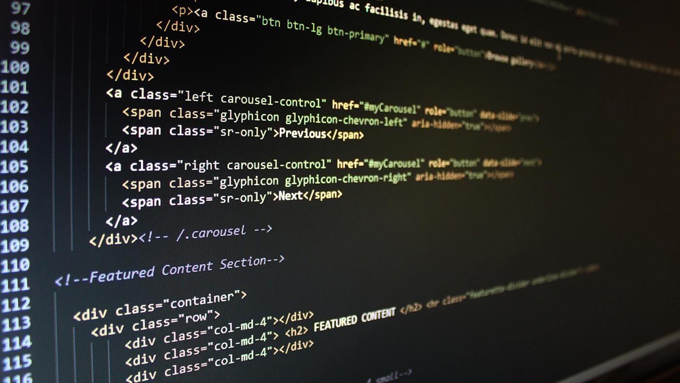 A close-up photo of web development code.