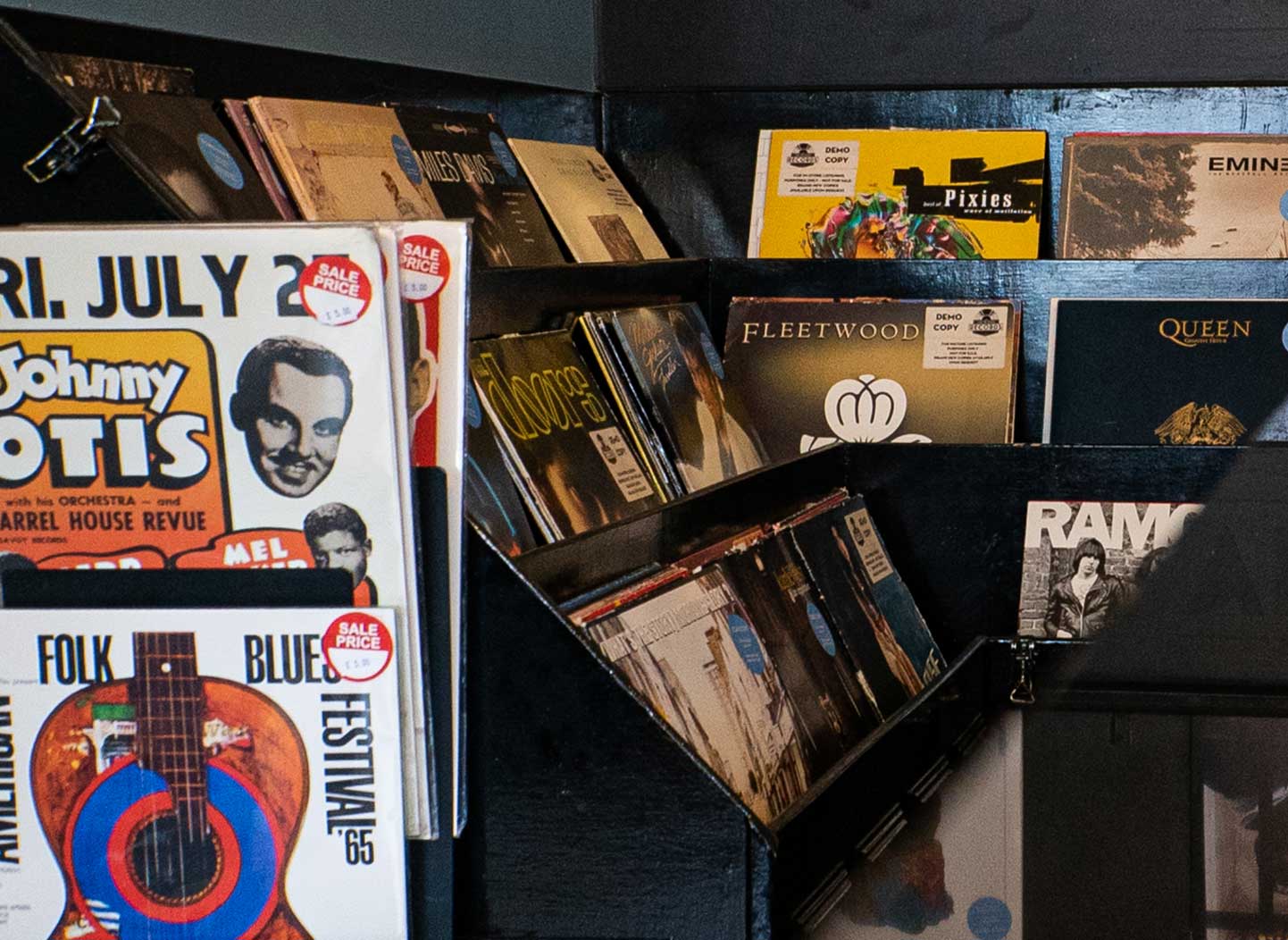 A picture of various records at a record store.