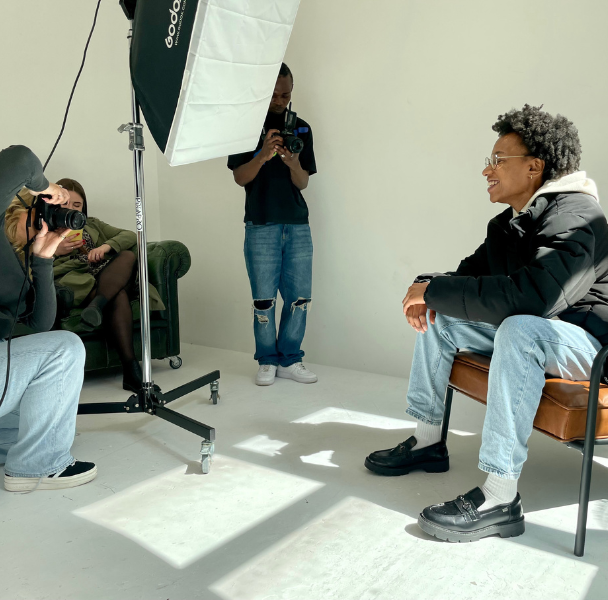 a group of students in a photography studio